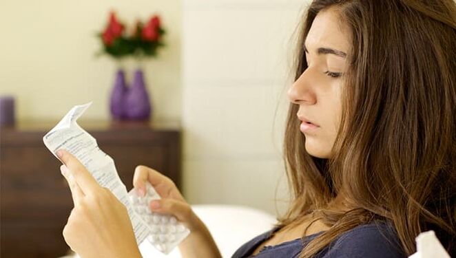 reading the instructions for deworming tablets